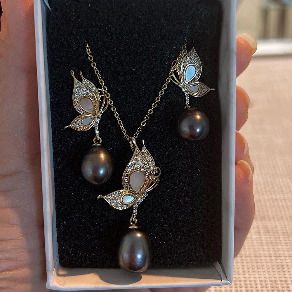 Fresh water pearl earrings and necklace. Non tarnish gold plated